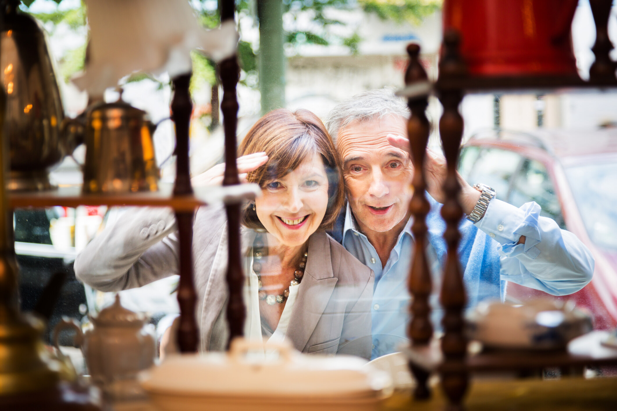 couple looking through a window