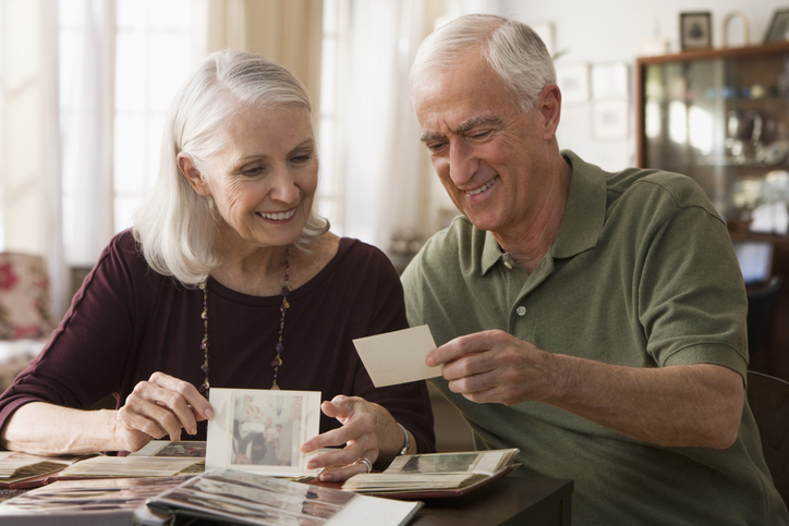 Senior Couple looking at photos