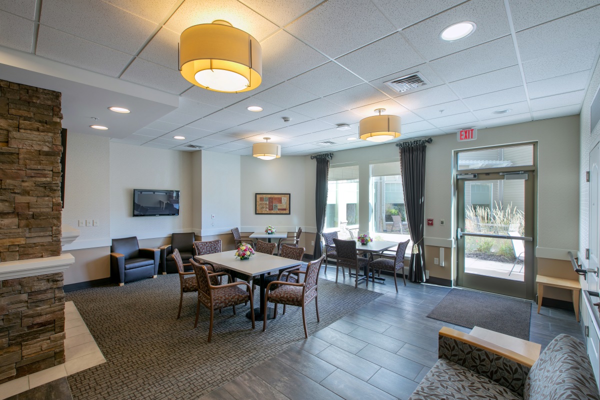 Holy Cross Rehabilitation lounge leading to outdoor courtyard